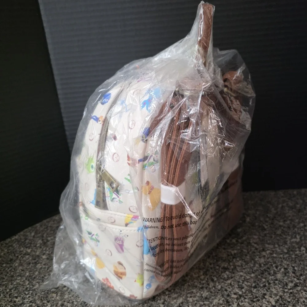 Loungefly Disney Pixar 25th Anniversary Icons Toy Story Nemo Backpack 2021 NWT